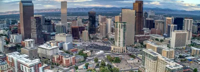 Denver skyline with Rocky Mountains in background