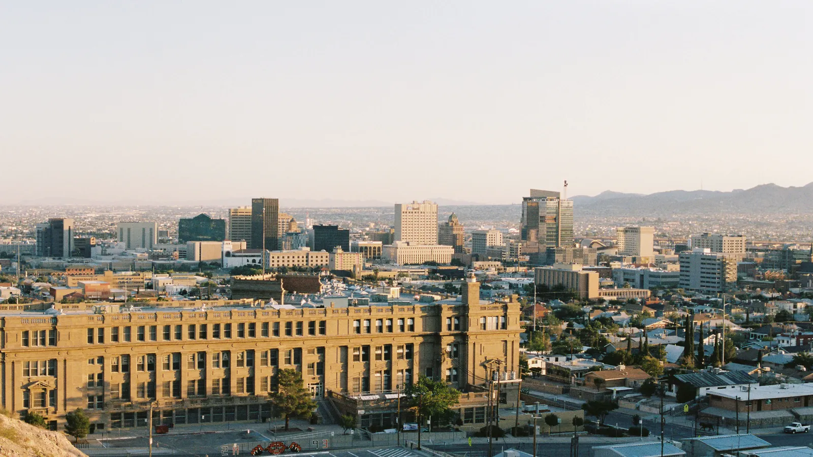 El Paso skyline with Franklin Mountains and Rio Grande border