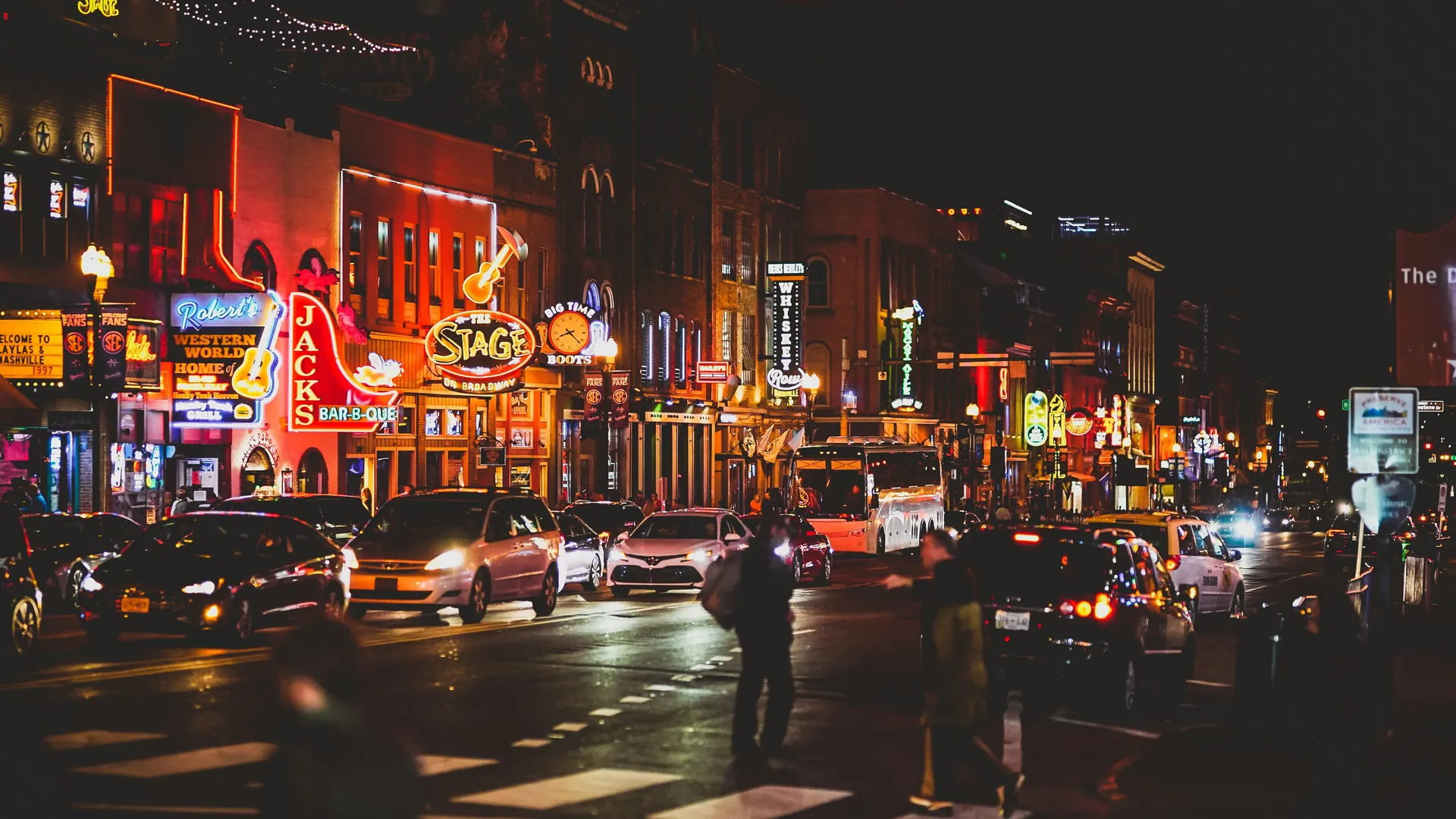 Broadway honky-tonk strip lit up at night, Nashville