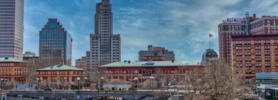 Providence skyline and WaterFire installation on the river