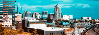 Raleigh skyline at dusk with North Carolina State Capitol